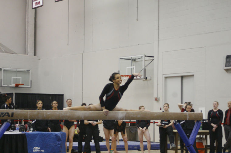 Junior Megan Melendez performs her balance beam routine at the gymnastics meet against Southeast Missouri State University on 2/2/13.
