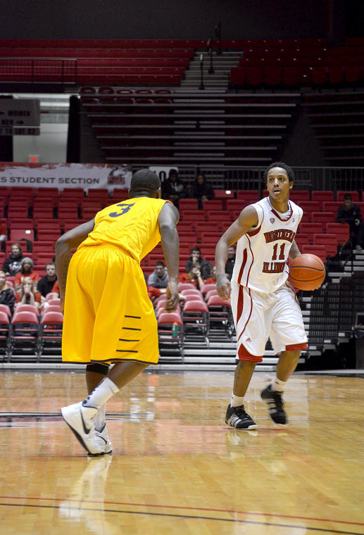 Freshman guard Daveon Balls (11) looks to pass the ball in the game against Kent State last Wednesday.
