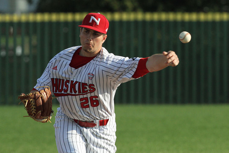 Sophomore Ben Neumann pitches at a baseball game last season.
