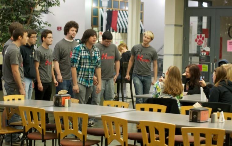 (From Left) Trent Snyder, Will Kirby, Billy Kokinis, Danny Cozzi, Jeremey Orbach, Clayton Mutert, Adam McNeil and Patrick Price perform a capella in Stevenson dining hall, October 25, 2011.
