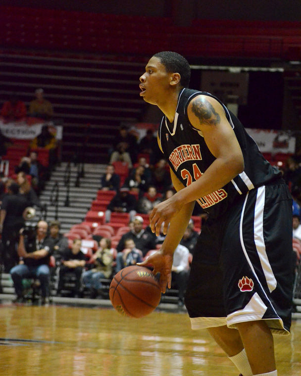Freshman Mike Davis dribbles the ball in the game against Central Michigan University on Saturday.
