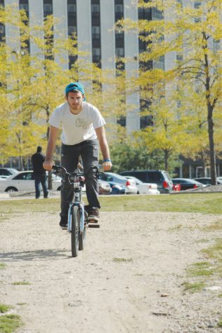 Mike Morocco, senior time arts major, takes the eco park bike pah as a shortcut back to his apartment in September 2011.