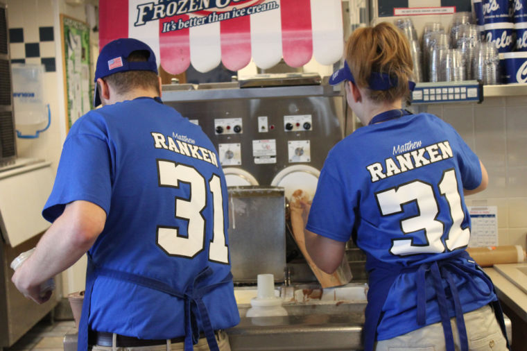 Culvers crew member Dave Campos (left) and Culvers trainer Rose Zaccone scoop custard for a customer on Tuesday evening for an event hosted by the Sycamore Culvers where 50% of proceeds was donated to the family of Matthew Ranken.
