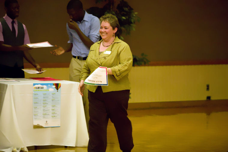 Social worker Kimberly Cecil accepts her Ally Award on Tuesday afternoon in the Regency Room of the Holmes Student Center in recognition for her service to the Lesbian, Gay, Bisexual, and Transgender community.
