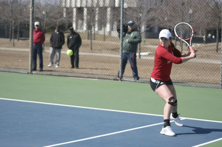Sophomore Stephanie McDonald sets up to return a volley on March 29 in the meet against Bowling Green State University.
