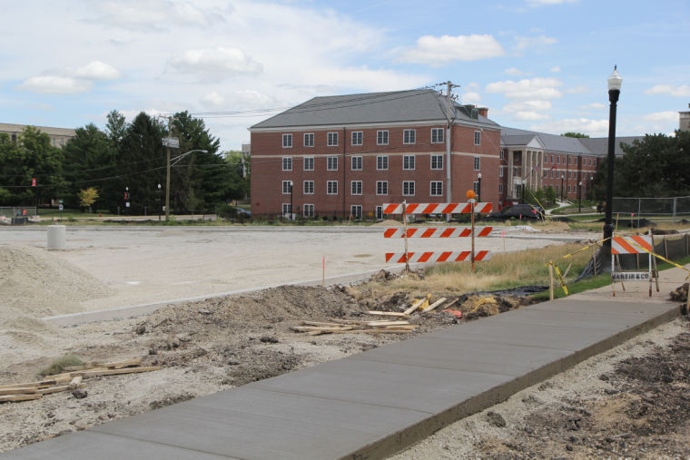 Construction continued Monday on the parking lot at the corner of Lucinda and Garden Avenue.
