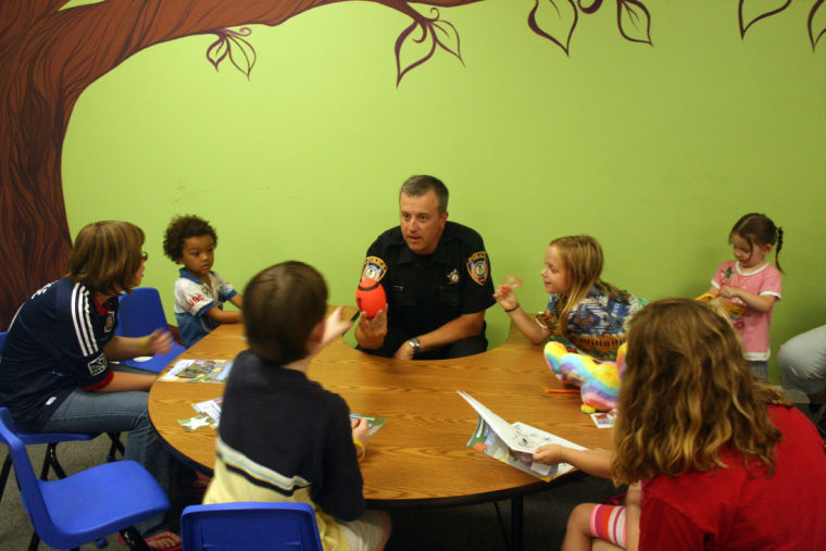 Cops talk zombies, police work with local children