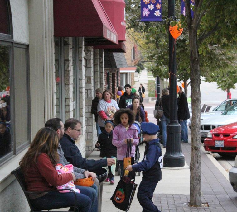 Trick or treaters filled the streets and sidewalks of downtown DeKalb along Lincoln Highway during Saturdays Spooktacular event. Kids went from storefront to storefront as patrons and shopkeepers handed out candy, treats and prizes.