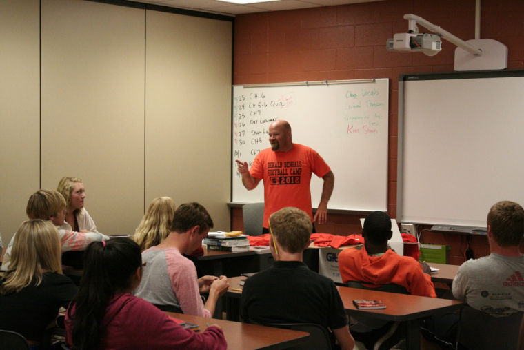 Mark Sykes, DeKalb High School drivers education teacher, brainstorms with his free study hall class Monday on ways to raise votes for Celebrate My Drive, a contest to raise awareness of safe-driving habits like not texting while driving. The winning school will receive a concert by Kelly Clarkson. Voting starts on October 18. More information can be found on twitter @dekalbcmd.
