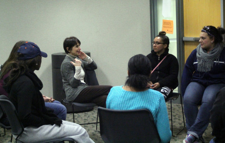 Media studies professor Laura Vazquez (center) leads a discussion based on the events in her documentaries about homelessness Monday in the Stevenson Smart Classroom. Students shared stories about their personal lives and how hardships affected their lives and environment.