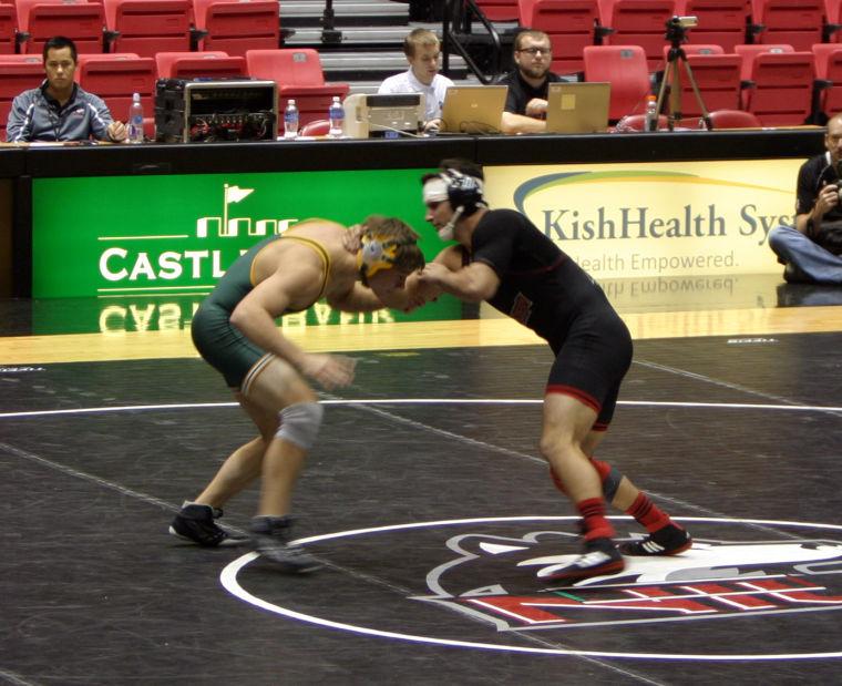 Redshirt junior Caleb Busson (right) faces off with North Dakota States Kurtis Julson Saturday in the Convocation Center.