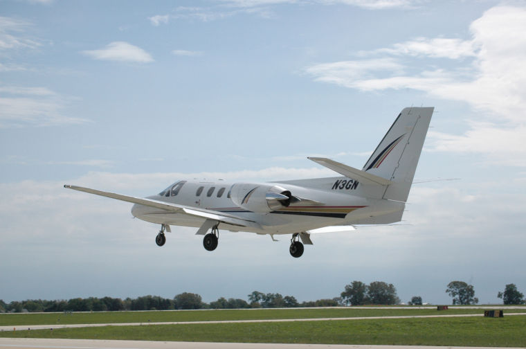 A corporate jet departs the DeKalb Taylor Municipal Airport after conducting business in DeKalb. The DeKalb Airport hopes to soon provide a more convenient option for NIU teams.