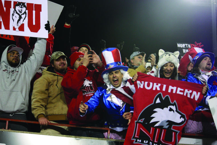 Fans cheer on the Huskies Nov. 13 during the game aginst Ball State.  The football team is headed to Detroit Friday for the MAC Championship game — NIU’s fourth consecutive appearance in the match — but NIU’s student travel package has already sold out. The package offered a round trip, meal and entry to the game. NIU does not currently have an alternative plan to help students get to the game.