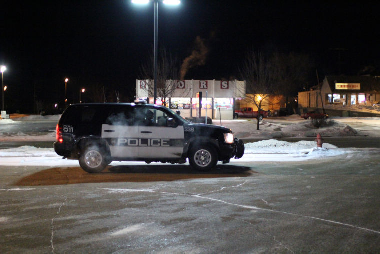 A DeKalb Police patrol car is parked near the 7-Eleven at the corner of Hillcrest Street and Annie Glidden Road in January. This is just one of the streets in the area that has been watched by the Police Department to reduce crime.