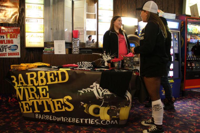The DeKalb County Roller Derby team, the Barbed Wire Betties, held a fundraiser Sunday for more bouts in DeKalb at The Lost Mine Lounge at Four Seasons Sports, 1745 DeKalb Ave. A booth was set up to sell Barbed Wire Betties merchandise.
