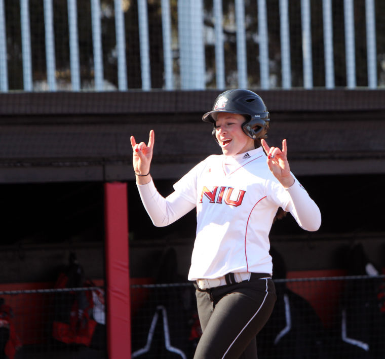 Senior Shelby Miller celebrates after coming in to score against Bowling Green Saturday. Miller has been taking on a larger leadership role for softball during her senior season.