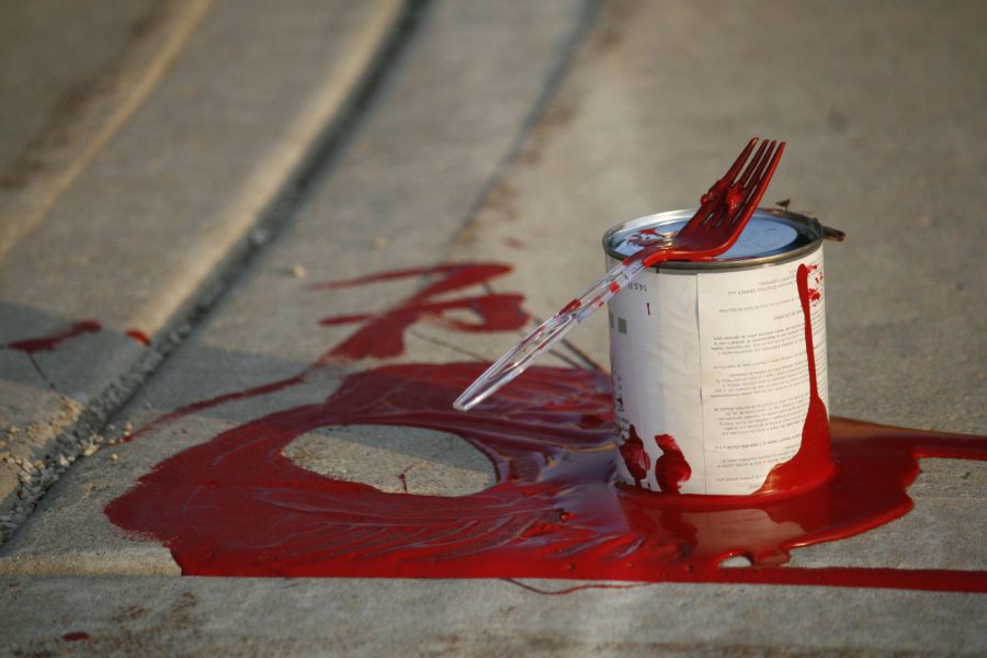 The red paint can witnesses said the woman used to vandalize the Martin Luther King Jr. Commons Friday.