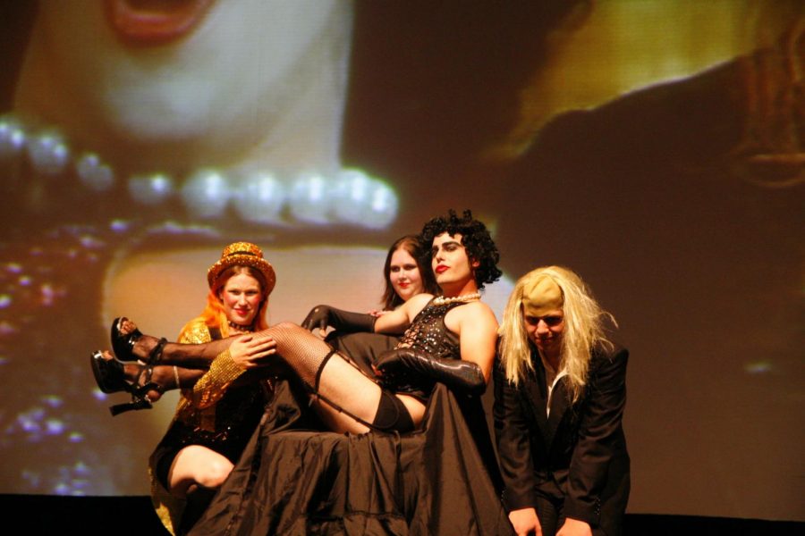Actors perform a scene in “The Rocky Horror Picture Show” theatrical production Sept. 5 at the Egyptian Theatre, 135 N. Second St. The theater will showcase the movie on Oct. 31 as apart of its Horror Film Series. 