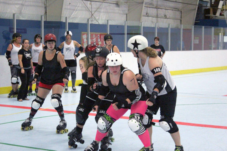 Barbed+Wire+Betties+team+members+practice+during+a+scrimmage+match+Oct.+4%2C+2013%2C+at+Kishwaukee+YMCA%2C+2500+W.+Bethany+Road.+The+Betties+raised+money+to+buy+a+roller+derby+track+so+they+can+host+home+meets+at+Huntley+Middle+School%2C+1515+S.+Fourth+St.+The+first+home+match+is+Nov.+8.