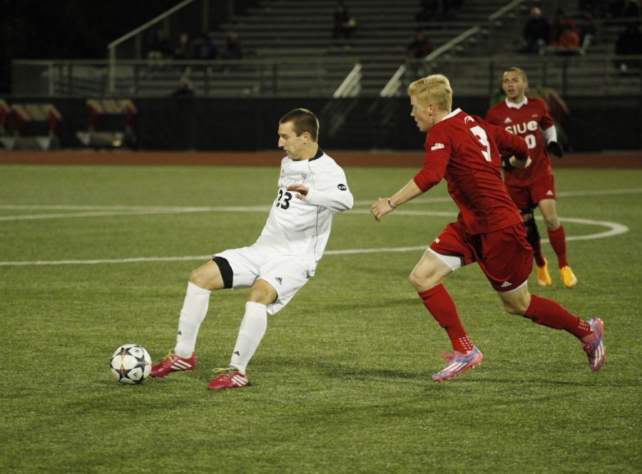 Sophomore defender Cody Witkowski (left) passes the ball Wednesday night at the Soccer and Track & Field Complex in the game against Southern Illinois-Edwardsville. Witkowski scored one of four NIU goals in the victory.