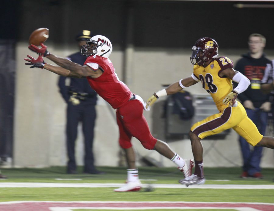 Da’Ron Brown, redshirt senior wide receiver, reaches to catch a pass Saturday at the Homecoming game against Central Michigan. The 34-17 loss at the hands of the Chippewas ended the Huskies’ 28-game home winning streak and 24-game MAC regular season winning streak.