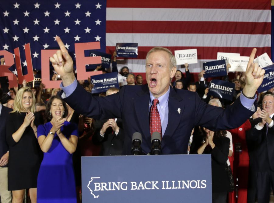 Republican gubernatorial candidate Bruce Rauner celebrates his win over Democratic Gov. Pat Quinn Tuesday in Chicago. Rauner claimed victory on Election Day, but incumbent Gov. Pat Quinn has not conceded as he said some votes have yet to be counted.