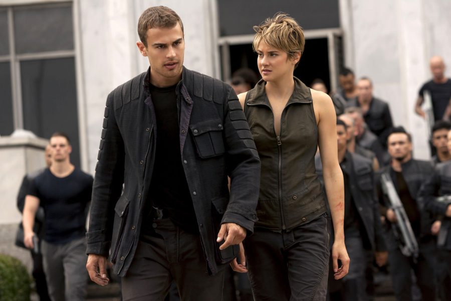 In this image released by Lionsgate, Theo James, left, and Shailene Woodley appear in a scene from "The Divergent Series: Insurgent."