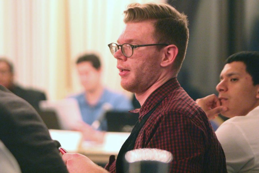 Student Association Senator David White discusses his bill to move SA executive elections to online voting during Sunday’s SA Senate meeting in the Holmes Student Center, Sky Room. White said online voting would increase voter participation, but other senators said turnout would be better increased with advertising.