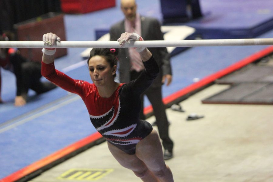Senior gymnast Morgan Johnson performs during the Feb. 15 competition against Bowling Green and Alaska at the Convocation Center. One month later the Huskies rewrote the school record books by scoring 195.8 points in the regular season finale against the Eastern Michigan Eagles on March 15 in DeKalb.