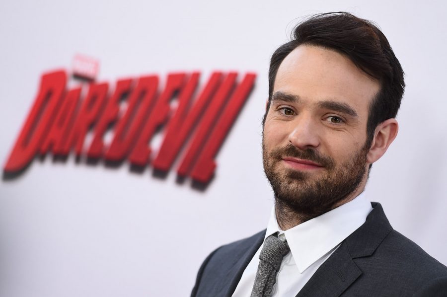 Actor Charlie Cox smiles at the L.A. premier of Daredevil on April 2. Daredevil battles crime which sets the dark story in motion.