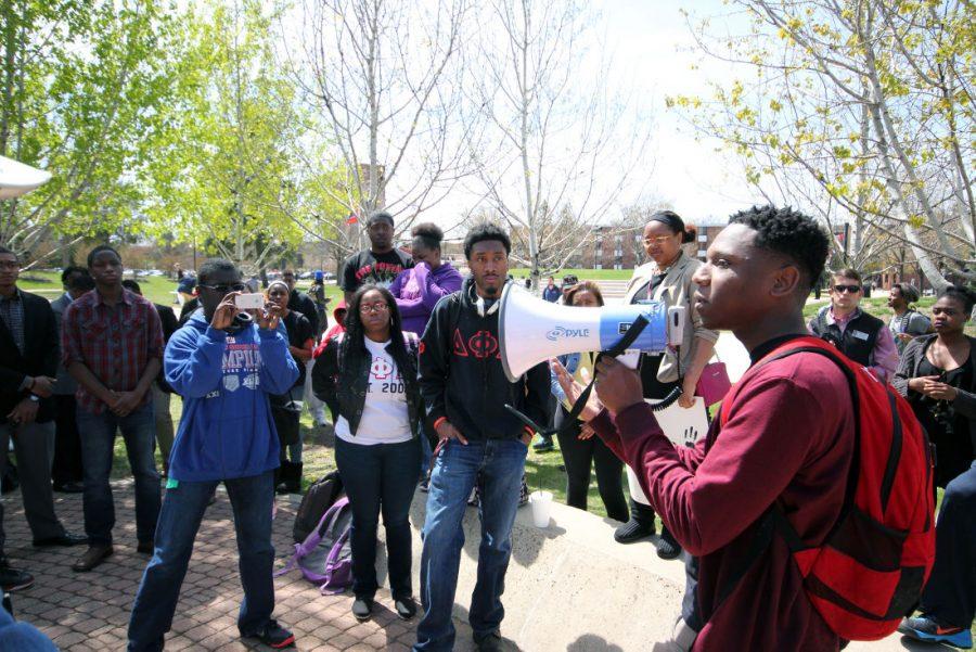 Students call for equality and unity during a rally Tuesday in the Martin Luther King Jr. Commons.
