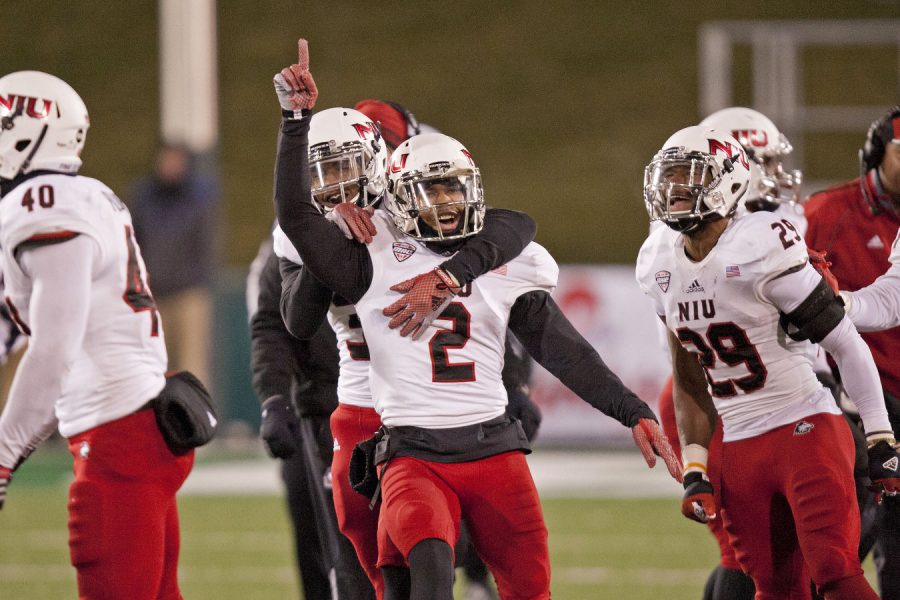 Junior+safety+Marlon+Moore+%282%29+celebrates+recovering+a+fumble+in+NIU%E2%80%99s+21-14+win+against+Ohio+on+Nov.+18+at+Peden+Stadium+in+Athens%2C+Ohio.+NIU+is+now+one+win+away+from+securing+a+trip+to+the+MAC+Championship.+The+Huskies+take+on+the+Western+Michigan+Broncos+10+a.m.+Nov.+28+at+Waldo+Stadium+in+Kalamazoo%2C+Mich.