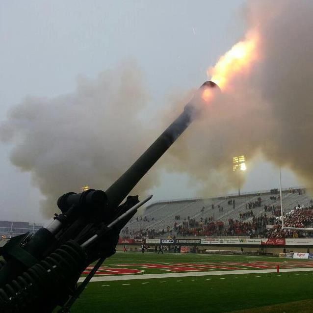 The M119A2 Howitzer fires after a touchdown during at football game at Huskie Stadium. The fate of the cannon is still up in the air, NIU President Doug Baker said.
