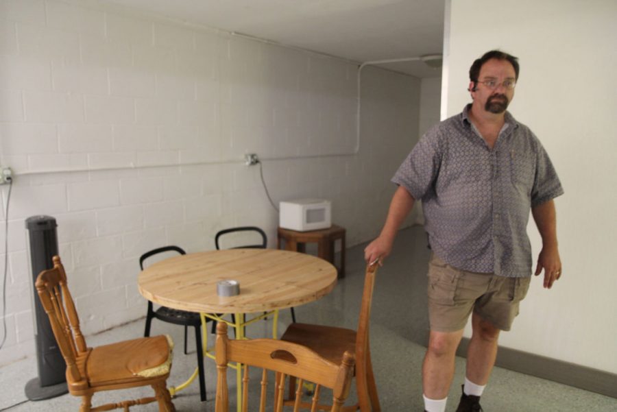 Property owner Jim Mitchell gives a tour of a house, 824 Greenbrier Road. The residence was recently rented out to the Veterans Association for housing military veterans, Army Reservists and National Guardsmen, among other military students.