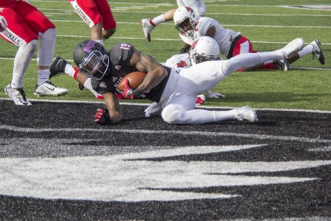 Then-junior wide receiver Kenny Golladay dives into the endzone for a touchdown on Saturday against Ball State. Golladay leads all Huskies in receiving, catching 34 passes for 529 yards and three touchdowns. (Northern Star File Photo)