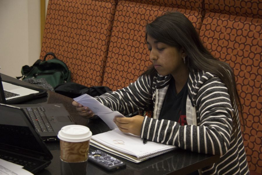 Nadia Ramos, freshman medical laboratory science major, studies using flashcards Oct. 14 in the Founders Memorial Library Cafe. 