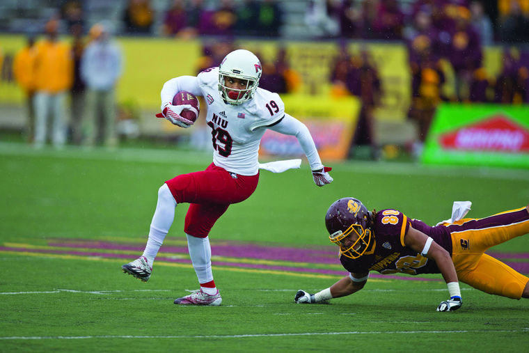 Sophomore cornerback Shawun Lurry returns an interception in a game against Central Michigan on Oct. 3. Lurry was named to the 2015 Autonation Football Writers Association of America All-America First Team on Monday.