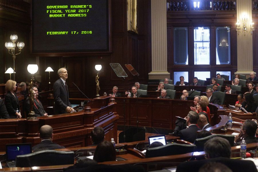 Gov. Bruce Rauner delivers his annual budget address to a joint session of the General Assembly in the House chambers at the Capitol Wednesday in Springfield.