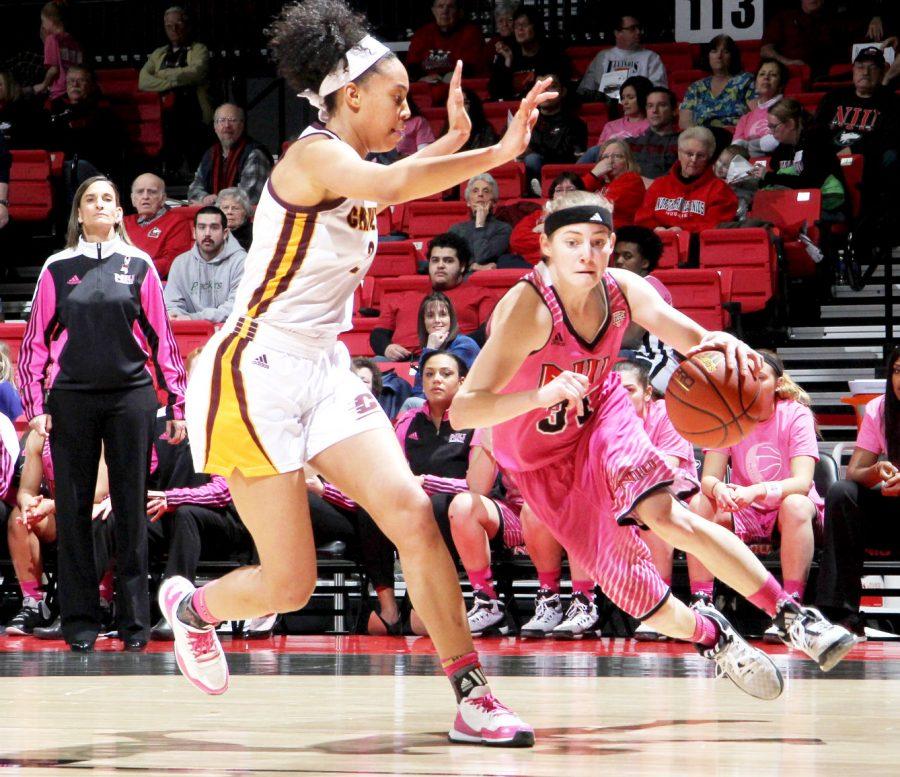 Junior guard Ally Lehman drives to the lane in a Feb. 13 game against Central Michigan University. Lehman scored 13 points and grabbed 12 rebounds Saturday against Eastern Michigan University, but the Huskies lost in a 84-60 blowout.