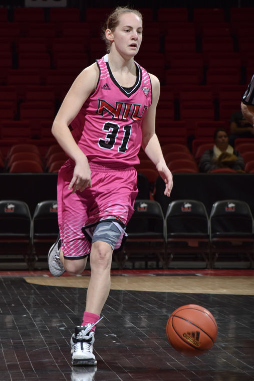 Junior guard Ally Lehman dribbles up the court in Wednesdays game against Ball State University. Lehman set an NIU single-season record for double-digit rebound games in a season but the Huskies fell 73-57. 