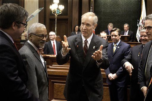Gov. Bruce Rauner speaks to lawmakers as he leaves the House chambers after delivering the State of the Budget Address to a joint session of the General Assembly on Wednesday at the Illinois State Capitol in Springfield. Rauner vetoed Senate Bill 2043 on Friday, which would have appropriated $397 million for MAP funding.