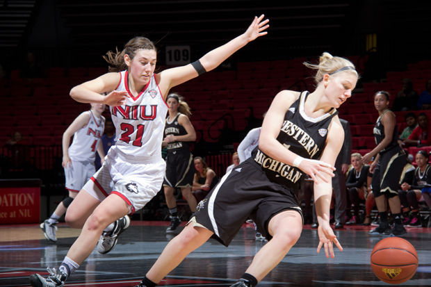 Freshman guard Mikayla Voigt (left) chases after an opposing player with seconds remaining on the clock during Saturdays game versus Western Michigan University.