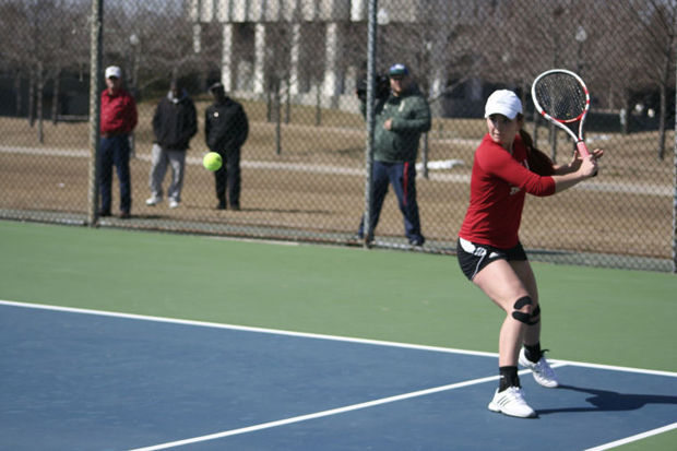 Christina Alvarez prepares to return a serve in a doubles match against Bowling Green University on March 29, 2013.