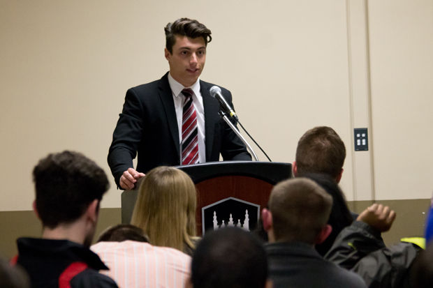Student Association presidential candidate Giuseppe LaGioia speaks during the SA Candidates Debate on Thursday in the Holmes Student Center, Heritage Room.