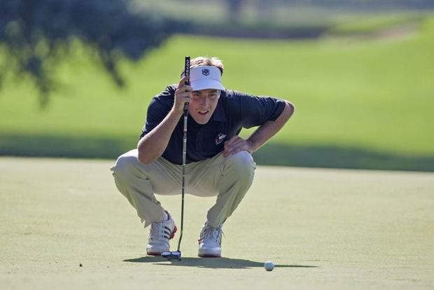 Senior Jordan Wetsch lines up a putt during the Northern Intercollegiate in September 2014. Wetsch finished 22nd in the Hoosier Collegiate tournament on Saturday.