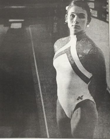 Sandy Menard was the first gymnast to compete in the NCAA Championships in Los Angeles on April 16-18, 1998. She qualified after completing the NCAA Central Regional gymnastics Championships.