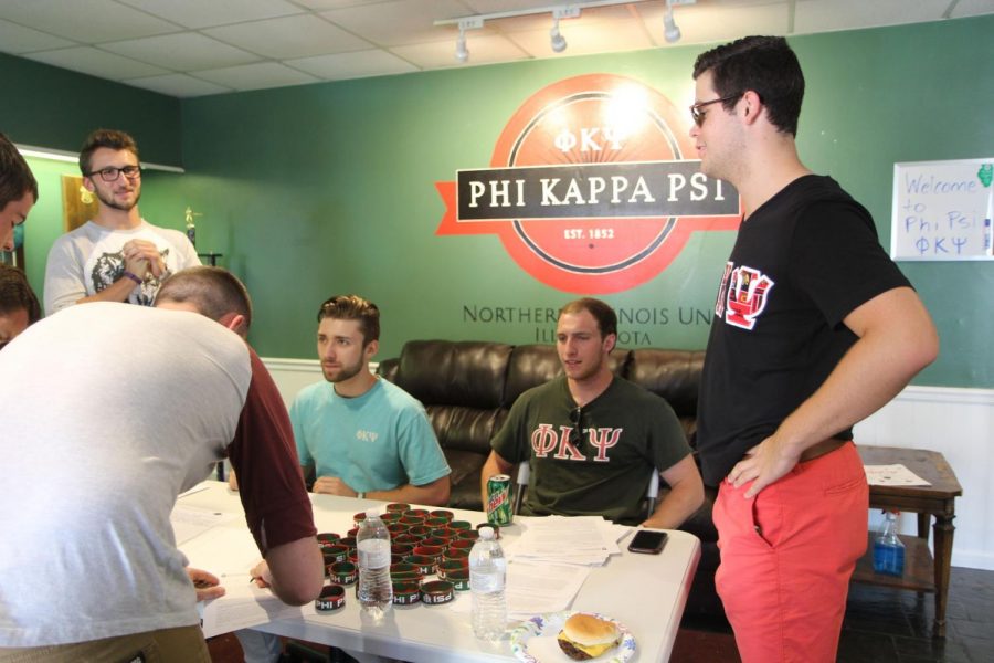 Members of Phi Kappa Psi sign students up to rush for the fraternity Aug. 31 at 924 Greenbrier Road.