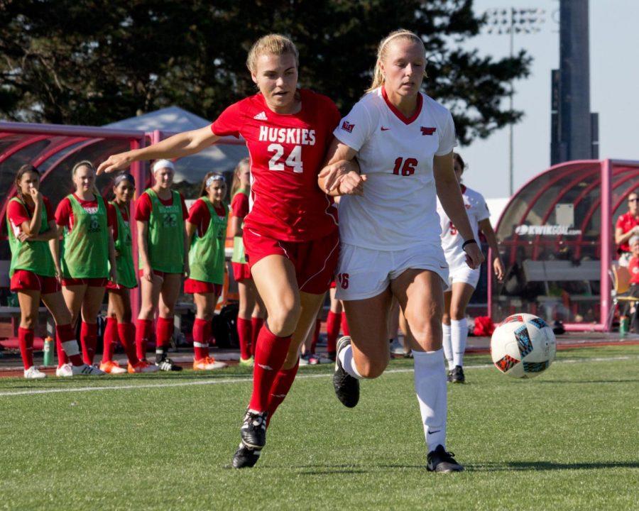Freshman forward Abby Gregg chases down the ball alongside an opposing player during a Sept. 18 match against Illinois State University. 