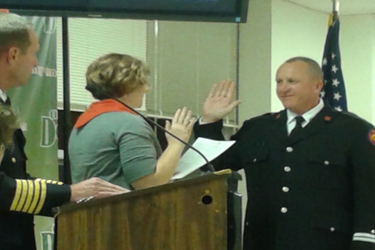 DeKalb Fire Captain Todd Stoffa is sworn into duty during a city council meeting 6 p.m. Monday. Stoffa has been a firefighter for 18 years.