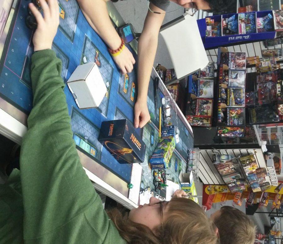 HeroClix is a turn-based game where players form their own group of heroes to battle.